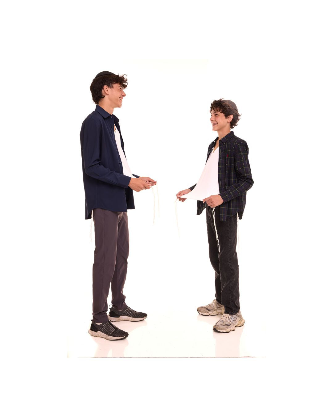 Two men wearing the white Le'Shem Tee under jackets