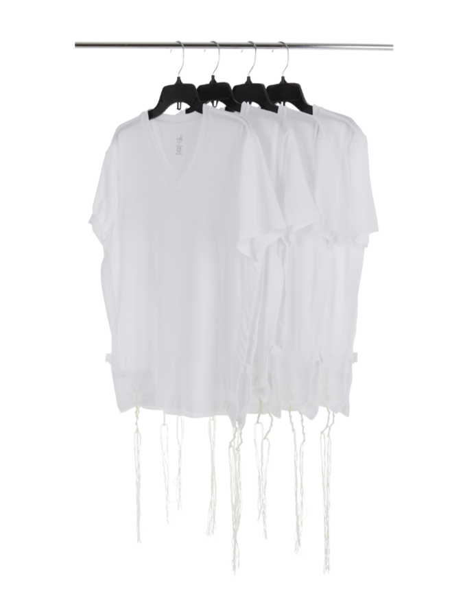 Le'Shem tzitzit hanging in a row