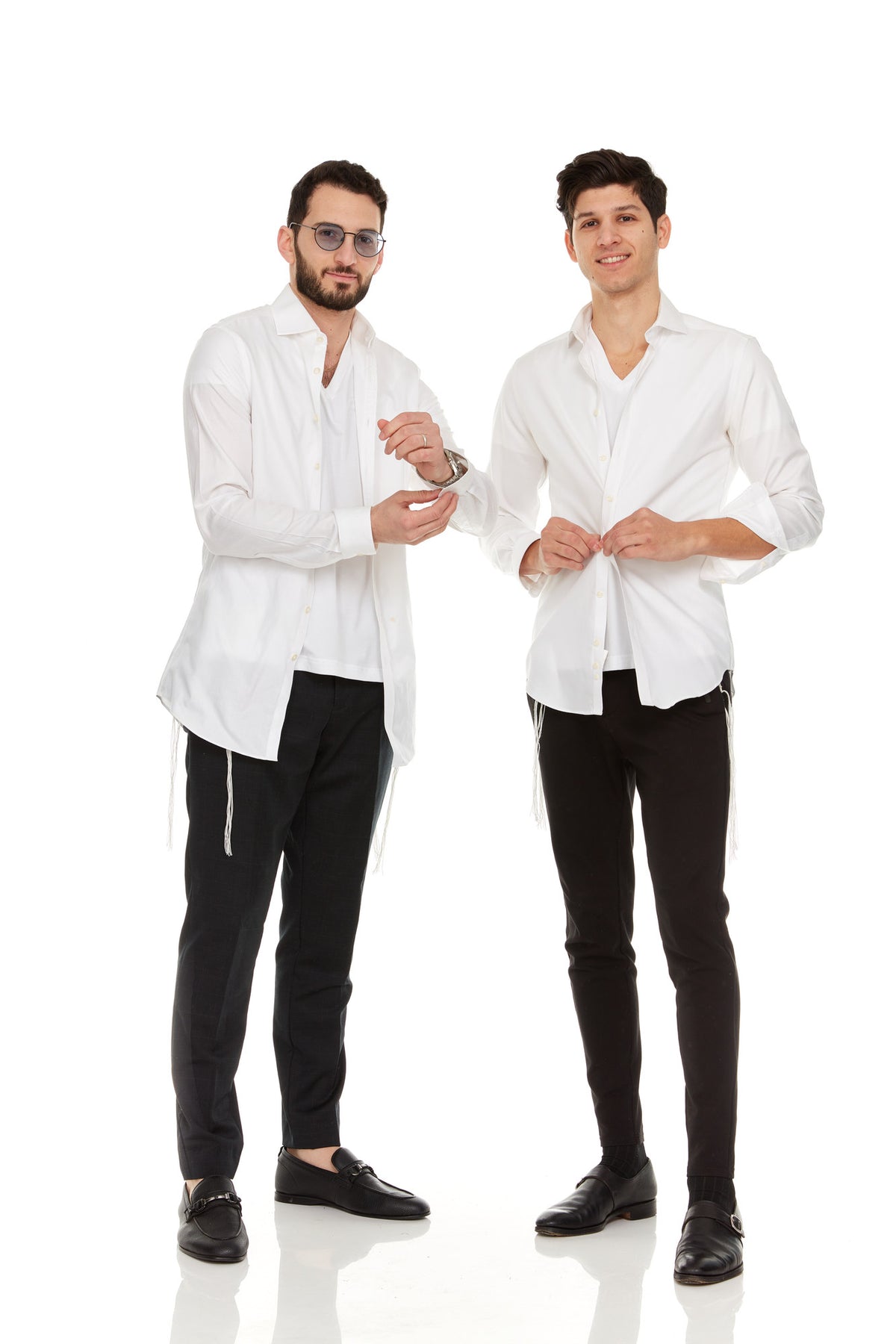 Two men wearing Le'Shem tzitzit under white shirts